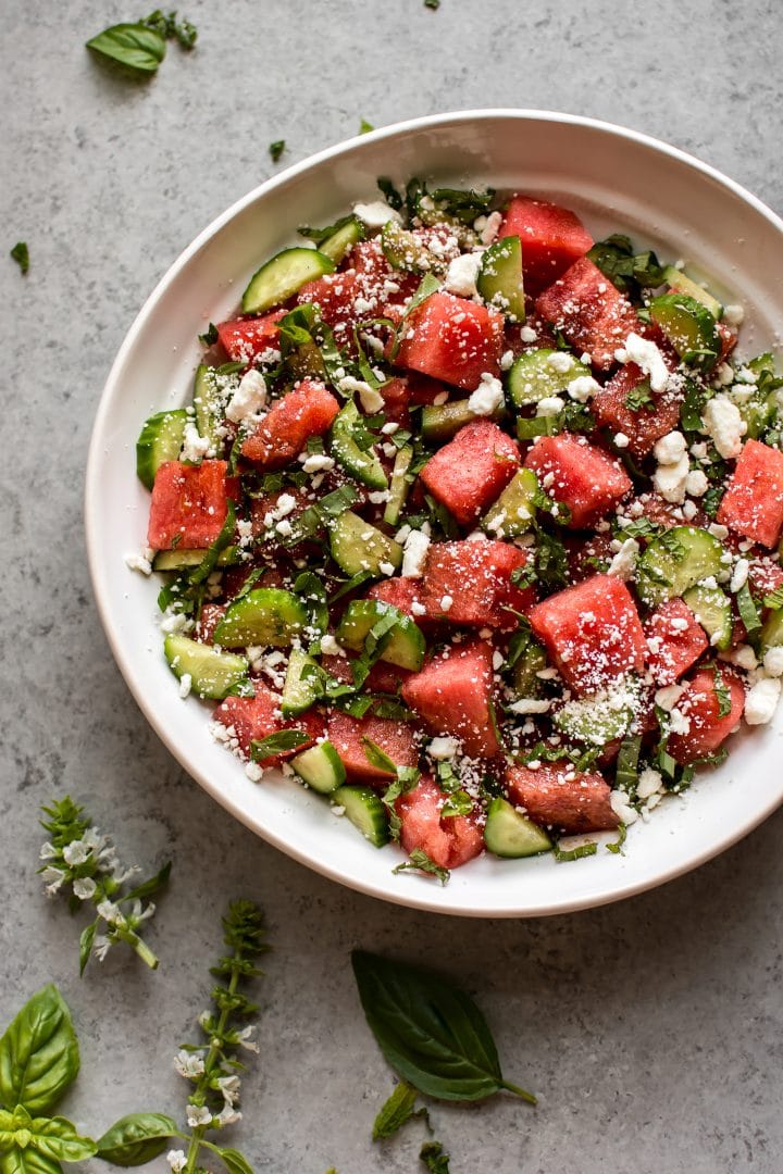 watermelon and feta salad in a white bowl