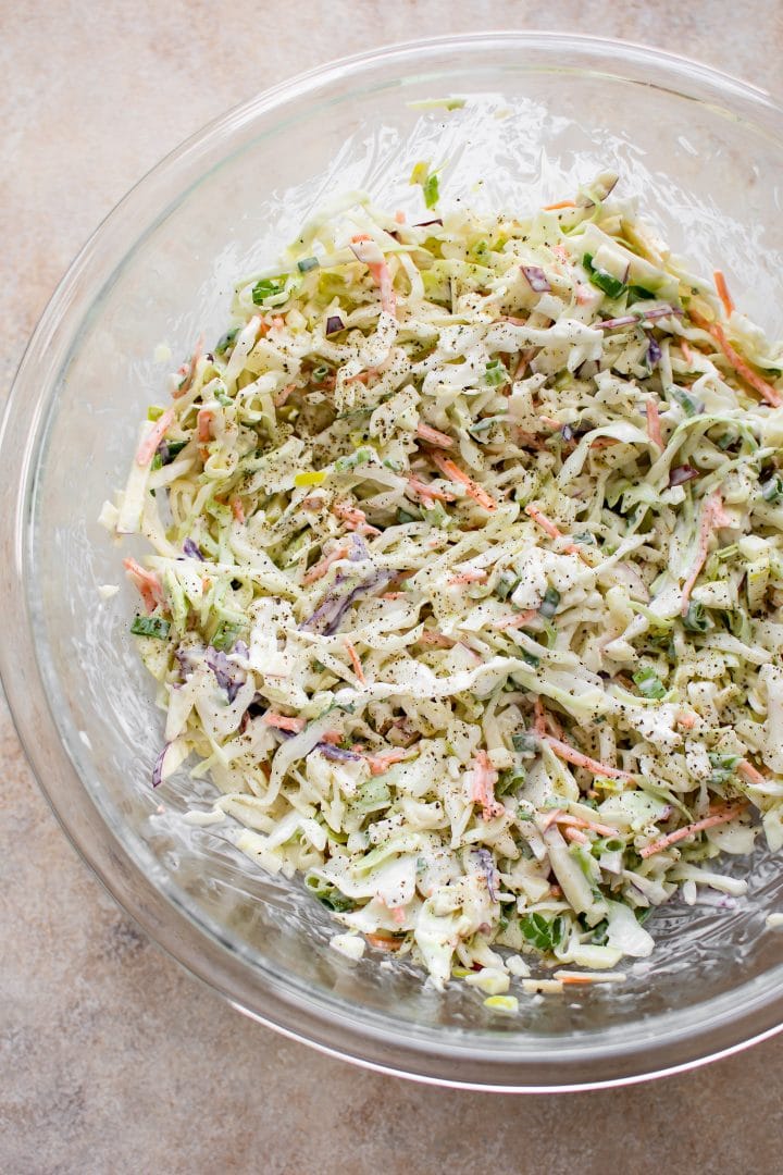 apple slaw in a glass serving bowl