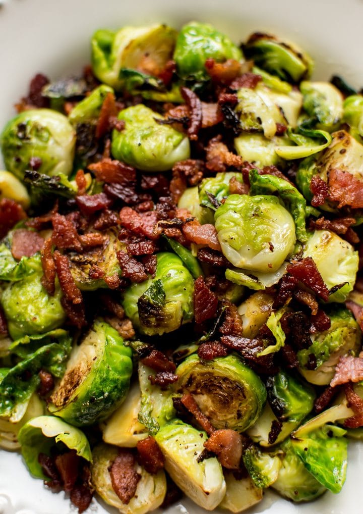 These bacon Brussels sprouts are an incredibly easy fall or winter side dish recipe with only two ingredients! Simple, quick, and delicious. 