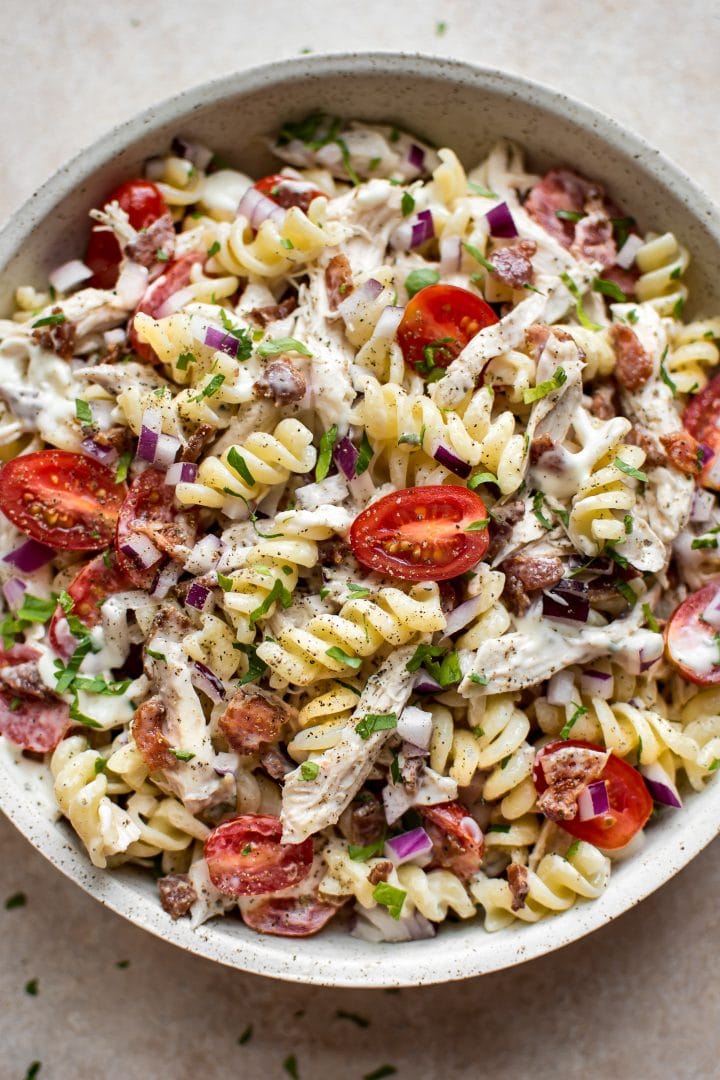 close-up of creamy chicken pasta salad with a tangy homemade ranch dressing in a bowl