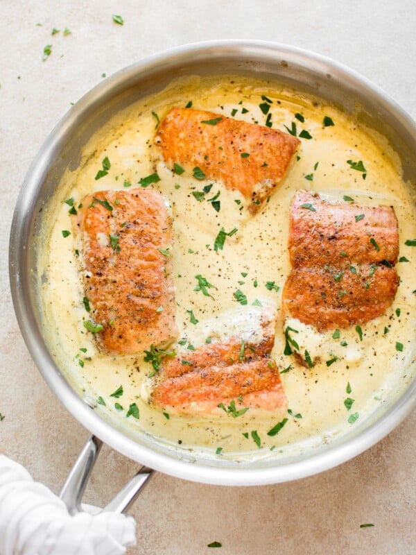 This salmon in a creamy Dijon mustard sauce is a simple comfort food dinner! This recipe can be made with either white wine or chicken broth. 