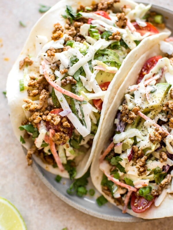 These ground pork tacos with apple slaw have a delicious seasoning mix that will make Taco Tuesday even better! The perfect easy dinner for meat lovers.