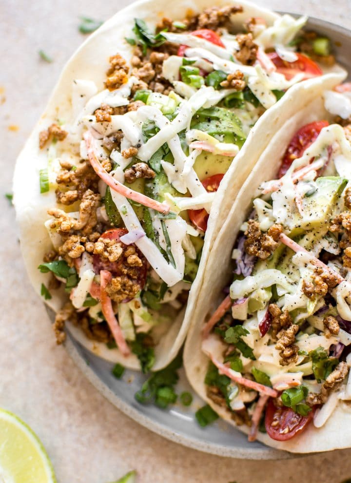These ground pork tacos with apple slaw have a delicious seasoning mix that will make Taco Tuesday even better! The perfect easy dinner for meat lovers.
