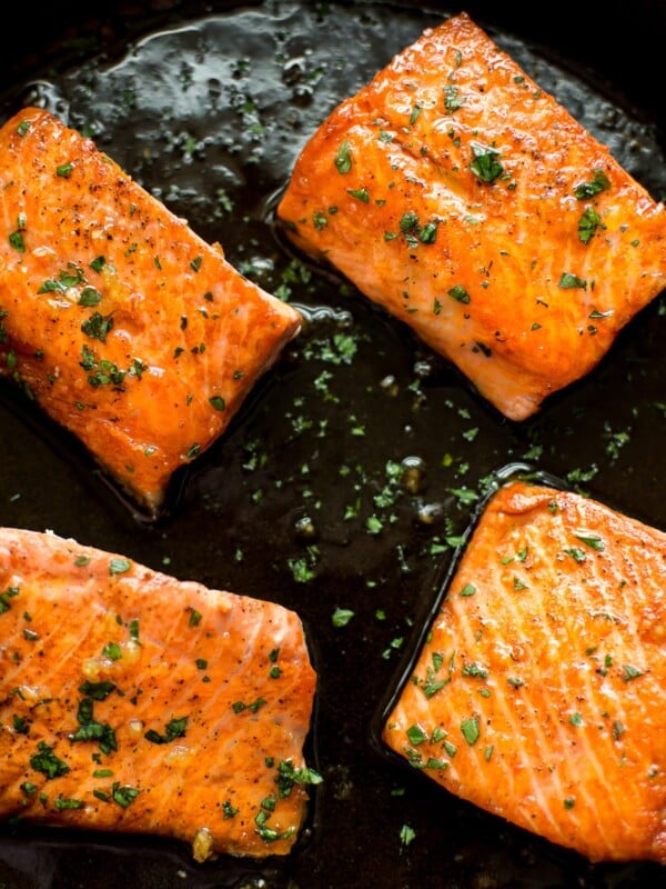 This easy honey garlic salmon recipe is made right in your skillet in less than 20 minutes. The salmon is pan-fried to perfection, and the honey glaze is totally delicious!