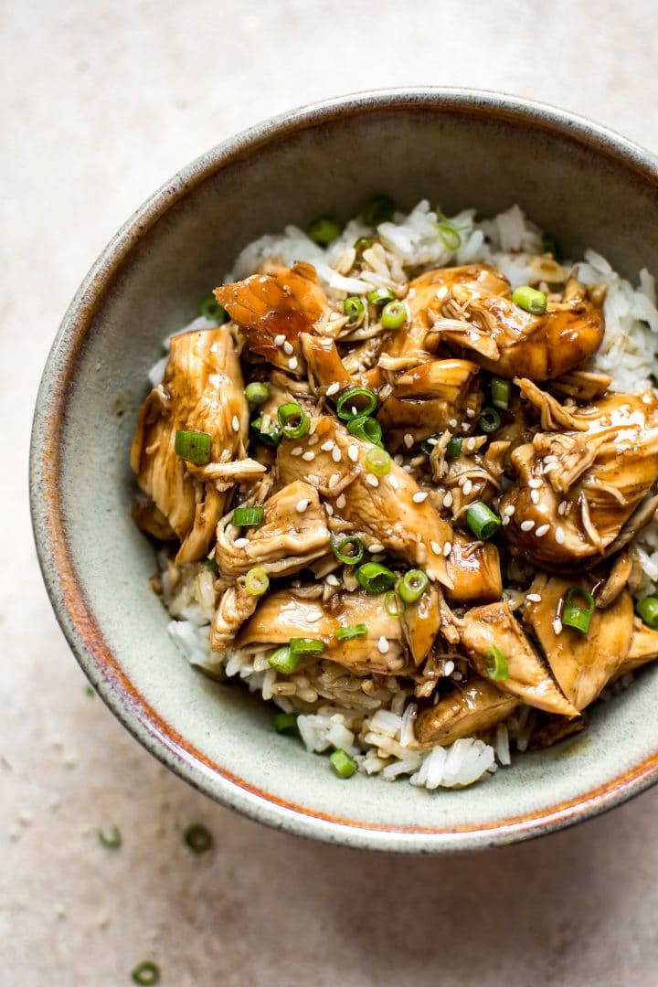 close-up of easy Instant Pot teriyaki chicken served over rice in a bowl