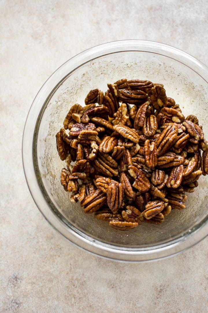 glass bowl with maple roasted pecans