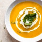 This easy vegan pumpkin soup from canned pumpkin is ready in under 30 minutes! A delicious and healthy dairy-free fall soup recipe.