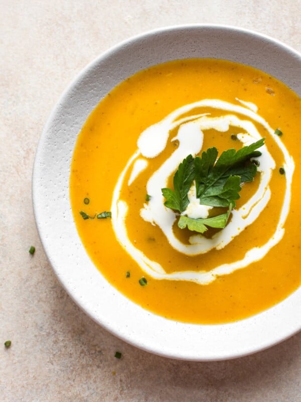 This easy vegan pumpkin soup from canned pumpkin is ready in under 30 minutes! A delicious and healthy dairy-free fall soup recipe.