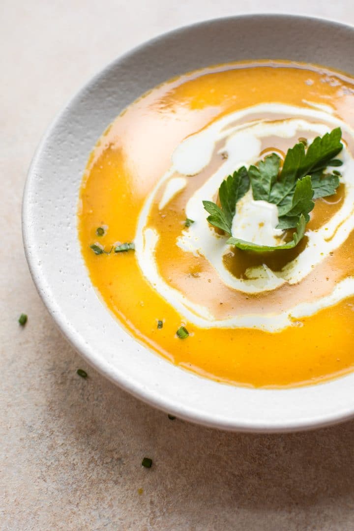 This curried pumpkin soup recipe is a delicious vegan fall soup that's fast and easy to make!