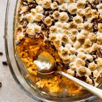 This simple baked sweet potato casserole recipe with pecans and marshmallows is the perfect Thanksgiving or fall side dish! This delicious traditional southern recipe can be made ahead if needed.
