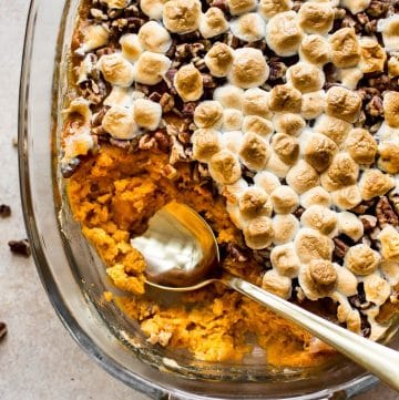 This simple baked sweet potato casserole recipe with pecans and marshmallows is the perfect Thanksgiving or fall side dish! This delicious traditional southern recipe can be made ahead if needed.