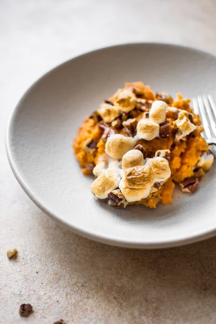 plate with sweet potato marshmallow casserole and fork