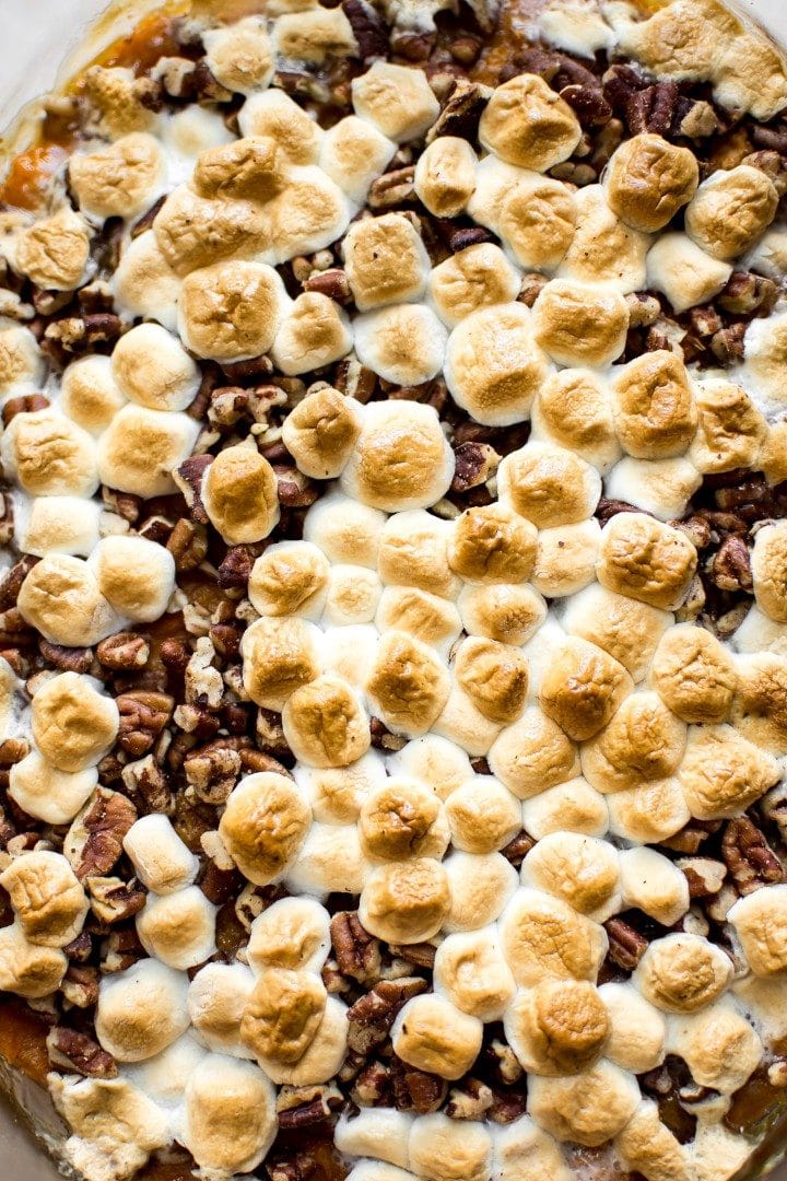 close-up of marshmallow sweet potato casserole with pecans