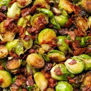 closeup of brussels sprouts and bacon in a skillet