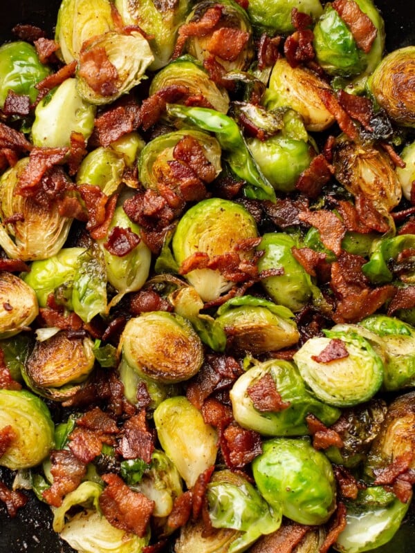 closeup of brussels sprouts and bacon in a skillet
