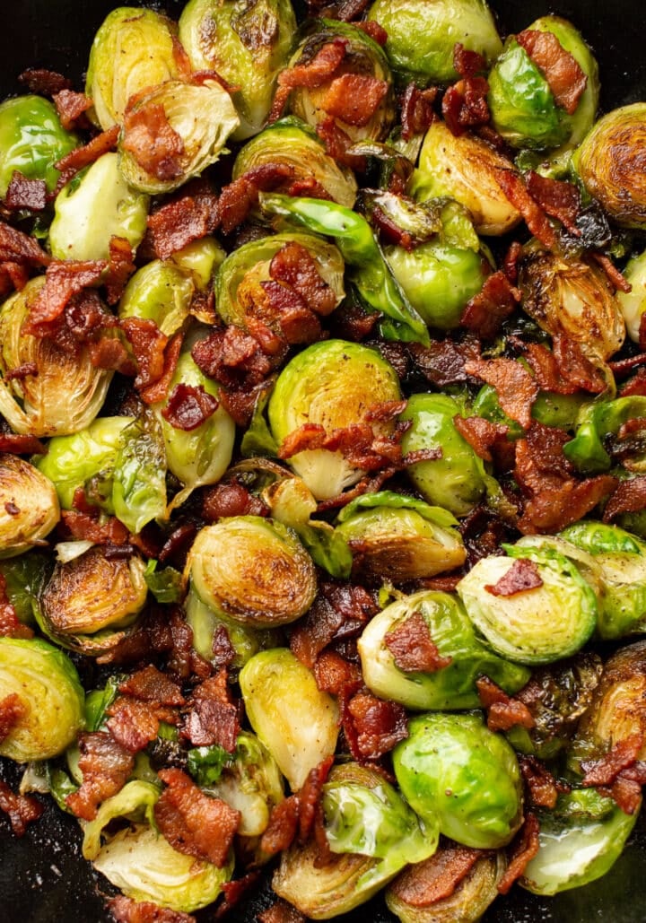 closeup of brussels sprouts and bacon in a skillet