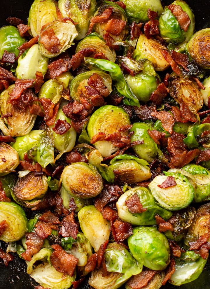 closeup of brussels sprouts and bacon in a skillet