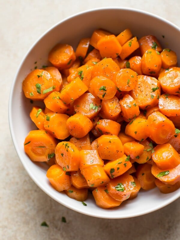 These delicious honey glazed carrots are easily roasted in the oven. They're sure to become a family favorite side dish recipe!