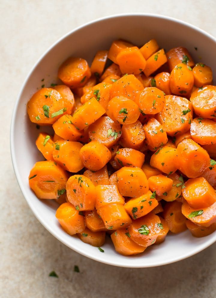 These delicious honey glazed carrots are easily roasted in the oven. They're sure to become a family favorite side dish recipe!