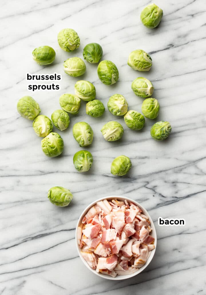 brussels sprouts and bacon on a marble countertop