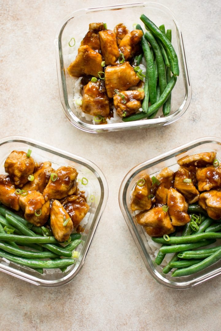 three simple homemade mongolian chicken with rice and green beans meal prep bowls