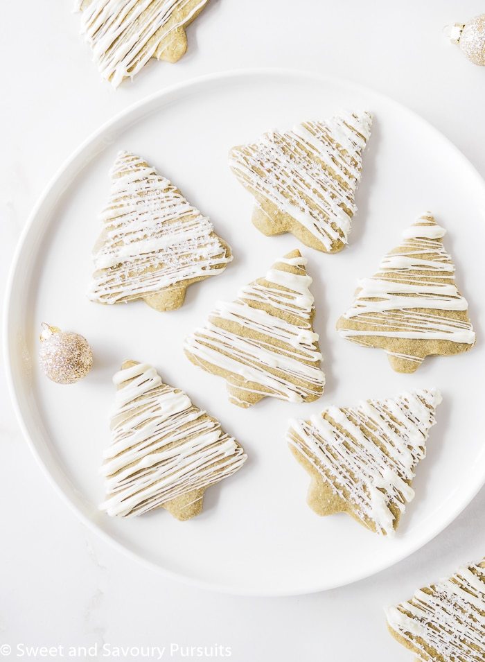 christmas tree shaped matcha green tea sugar cookies on a plate