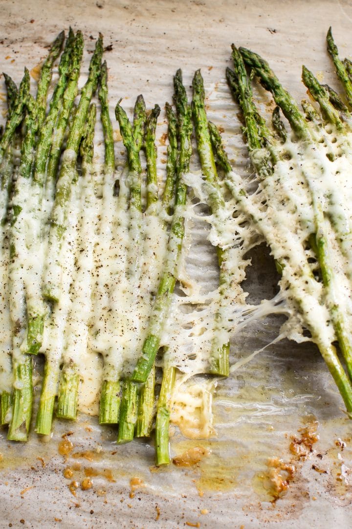 close-up of melted cheese in cheesy baked asparagus recipe