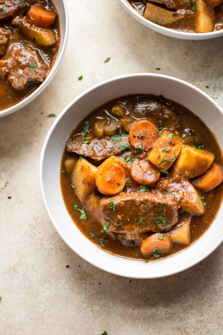 bowl of easy electric pressure cooker beef stew with carrots and potatoes