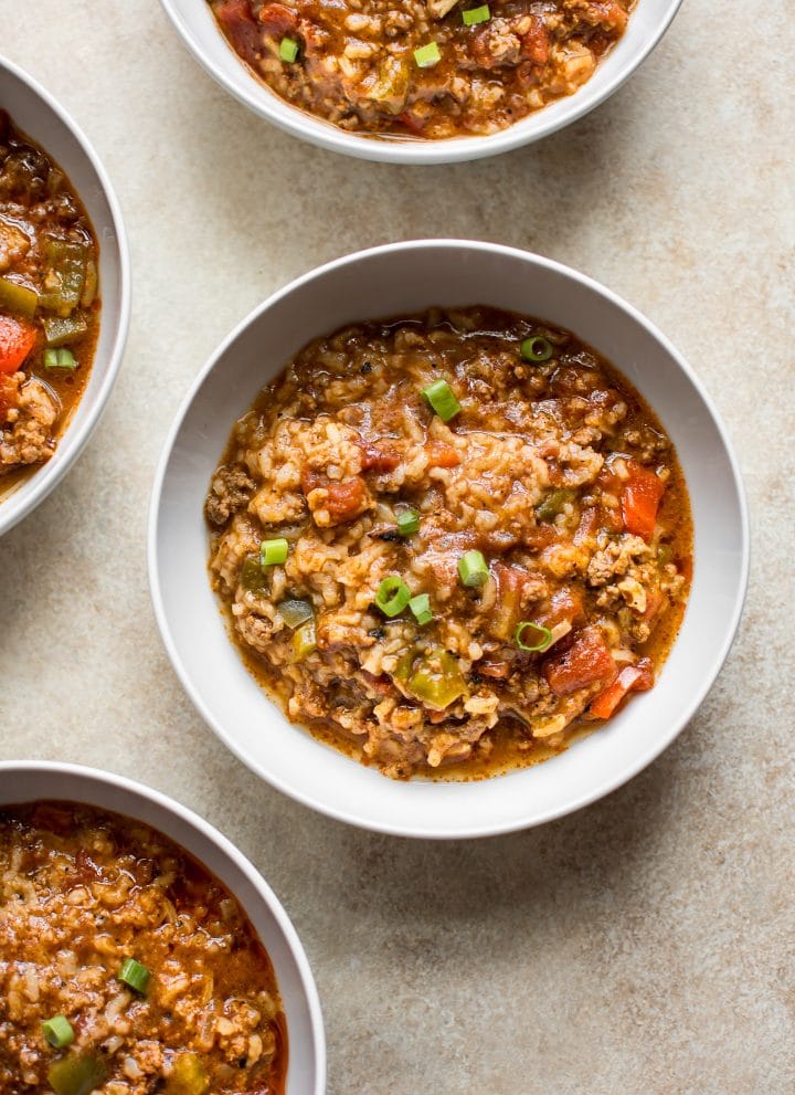You'll love this easy stuffed pepper soup that's made right in your Instant Pot! This family friendly recipe has hearty ground beef, red and green bell peppers, rice, and fire-roasted tomatoes that make this one delicious and healthy meal.