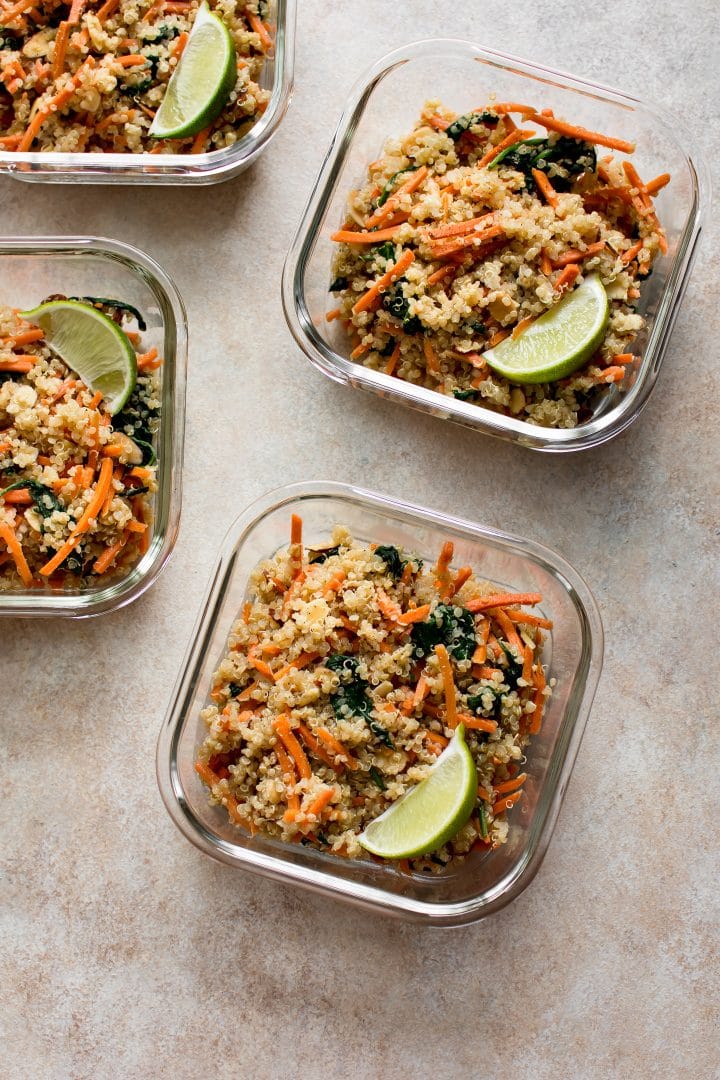 four vegan meal prep glass bowls with lime wedges