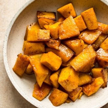 This easy honey roasted butternut squash recipe is a tasty vegetarian side dish that's perfect for your holiday menu. It's simple to make and sure to be a hit!