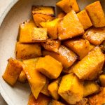 This honey cinnamon butternut squash recipe is perfect for fall, Thanksgiving, and/or Christmas! Tender sweet and savory roasted squash is perfectly caramelized to make the most delicious family friendly side dish.