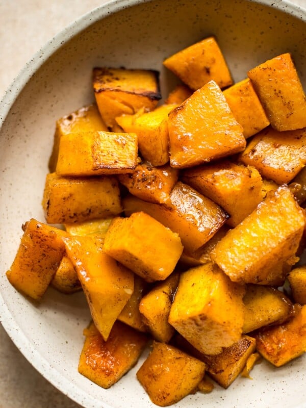 This honey cinnamon butternut squash recipe is perfect for fall, Thanksgiving, and/or Christmas! Tender sweet and savory roasted squash is perfectly caramelized to make the most delicious family friendly side dish.