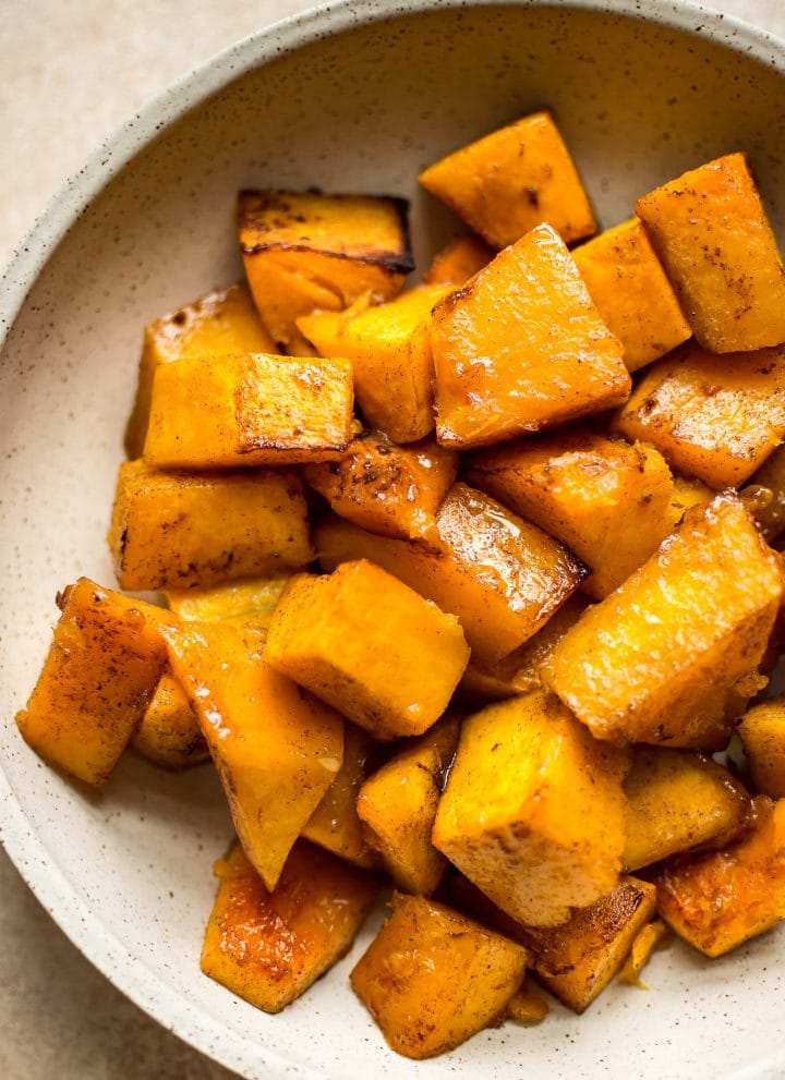 This honey cinnamon butternut squash recipe is perfect for fall, Thanksgiving, and/or Christmas! Tender sweet and savory roasted squash is perfectly caramelized to make the most delicious family friendly side dish.
