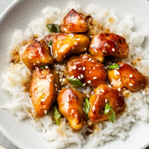 easy teriyaki chicken in a white bowl with rice