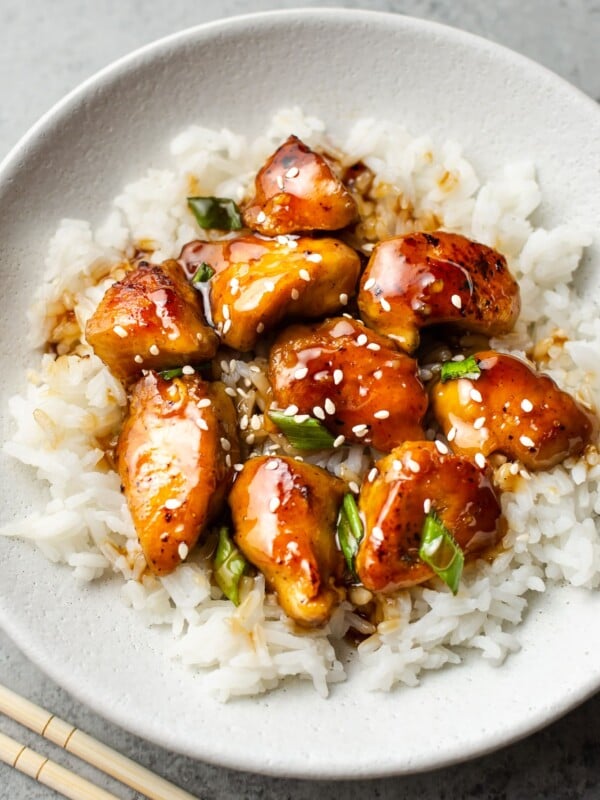 easy teriyaki chicken in a white bowl with rice