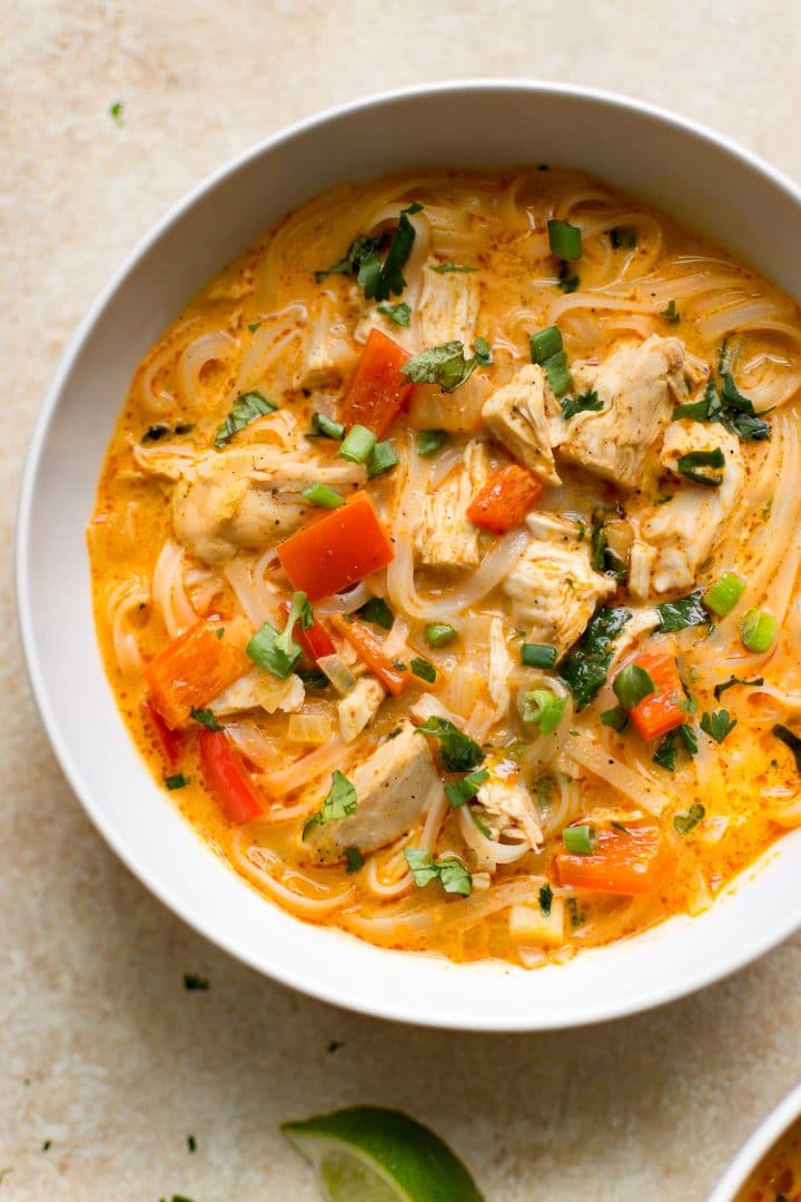 Easy leftover turkey soup with a red curry coconut milk broth and rice noodles. So healthy and delicious!