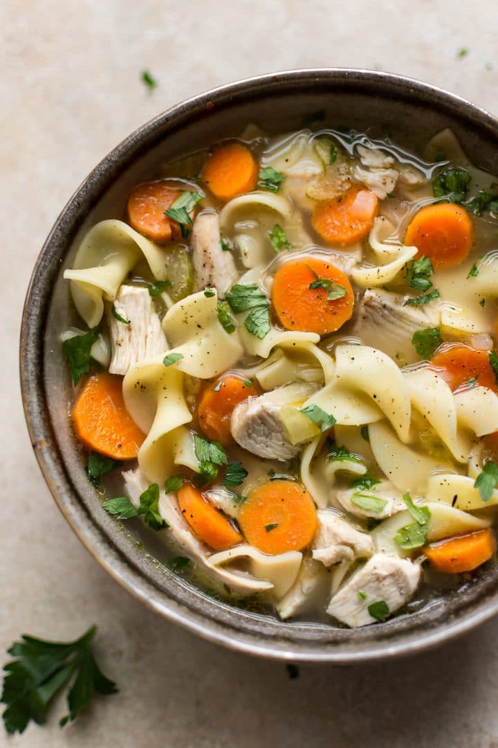 close-up of easy turkey noodle soup made from leftover turkey in a bowl