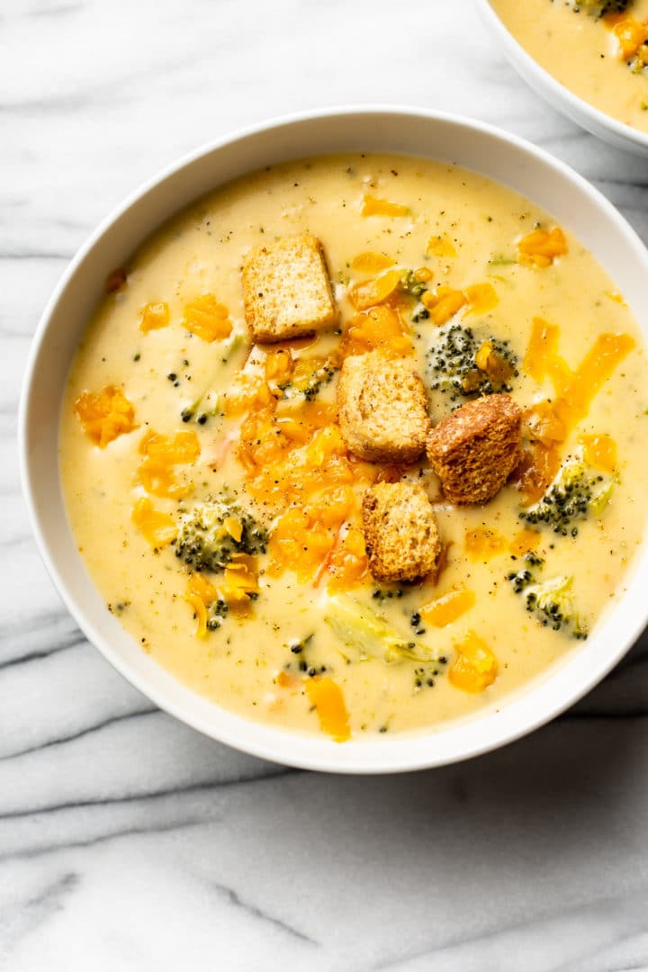 close-up of a bowl of homemade broccoli cheddar soup