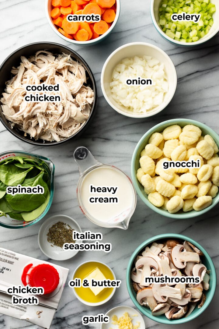 ingredients in small bowls on a counter for making easy chicken gnocchi soup