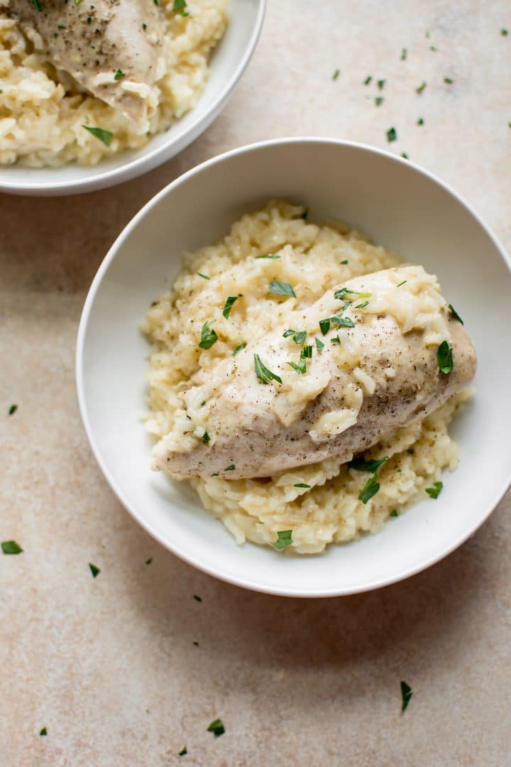 close-up of Instant Pot lemon chicken and rice in a white bowl