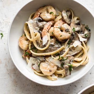 This creamy shrimp and mushroom pasta recipe is fast and simple! Great for weeknight dinners, date night, or dinner parties.