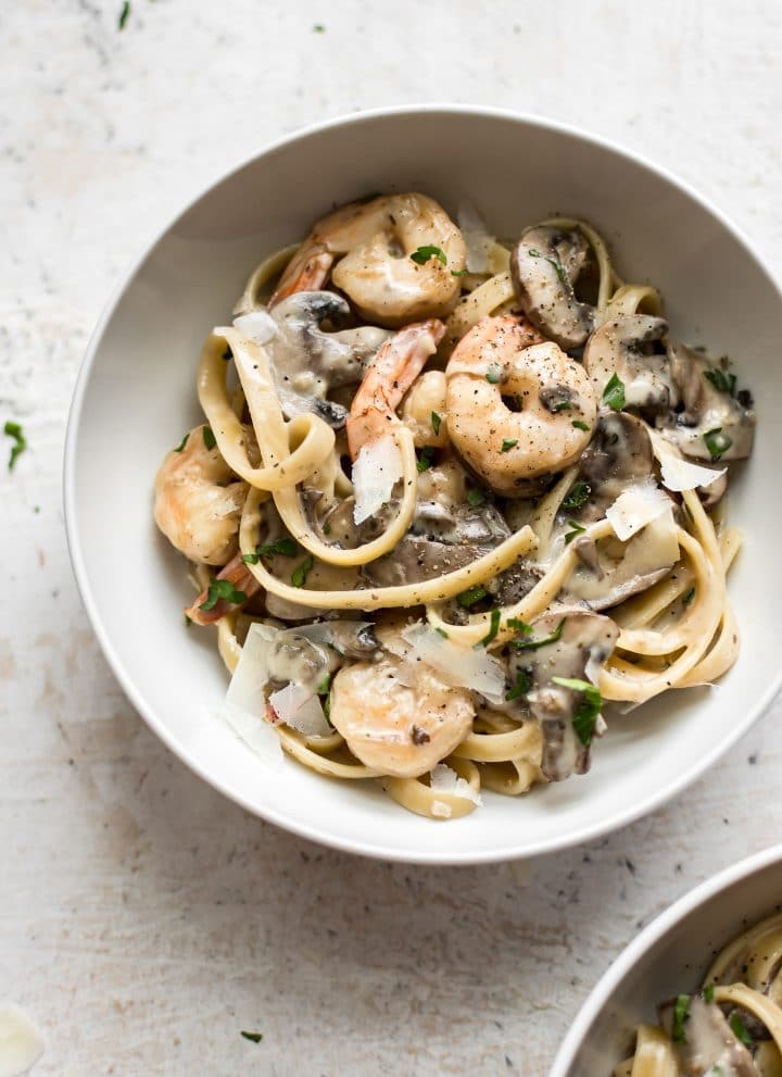 This creamy shrimp and mushroom pasta recipe is fast and simple! Great for weeknight dinners, date night, or dinner parties. 
