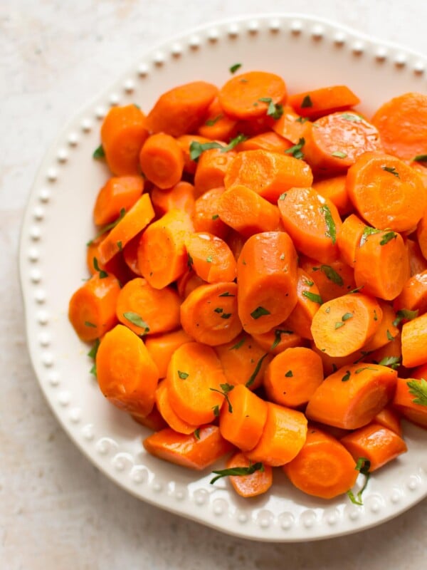 These slow cooker honey glazed carrots make the best easy side dish! Minimal prep and little effort yield delicious results. 