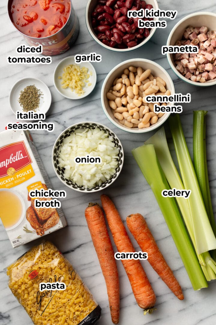 ingredients for pasta e fagioli on a marble surface