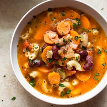 Pasta e fagioli soup is easy to make in your Instant Pot! Pasta, beans, veggies, and pancetta make one cozy and flavorful soup that the whole family will love.