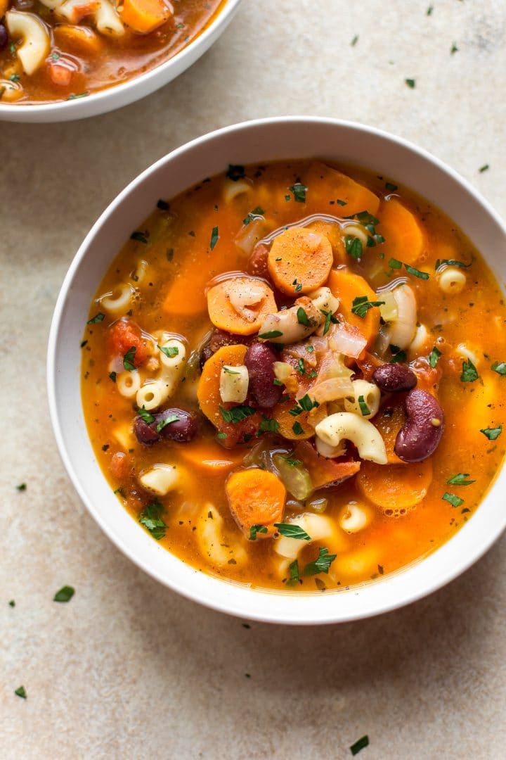 white bowl with pasta e fagioli soup