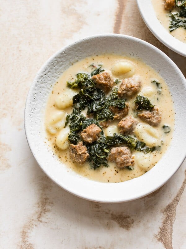 This creamy gnocchi soup with sausage and kale is hearty and easy to make. The perfect weeknight family dinner recipe!