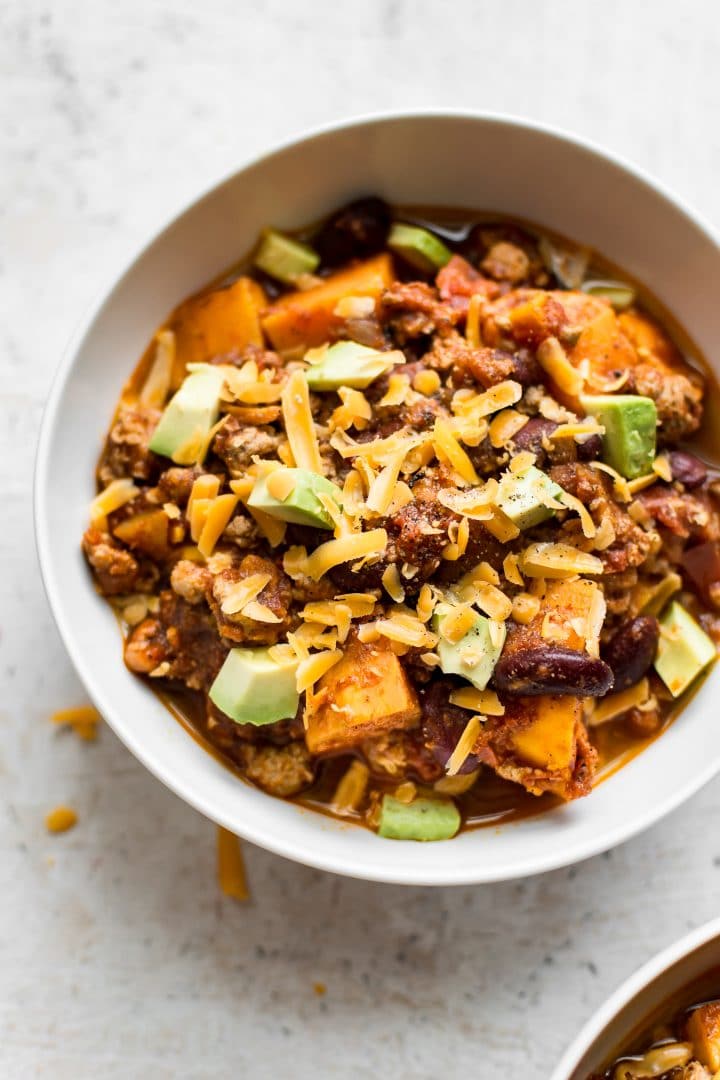 This healthy turkey sweet potato chili will soon become a new family favorite. Make it as spicy (or mild) as you like, and top it with cheddar, avocado, sour cream/Greek yogurt and/or anything else you can think of for a delicious and comforting meal. Perfect for meal prep!