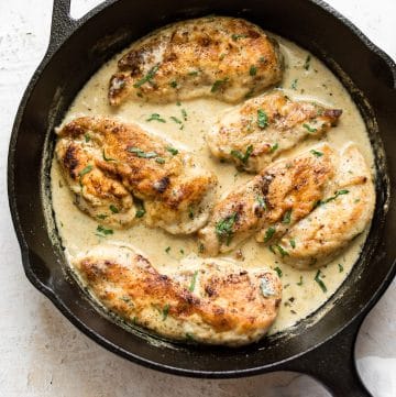 This creamy white wine chicken is an easy skillet dinner that's sure to impress! The sauce is delectable, and it's ready in about half an hour.